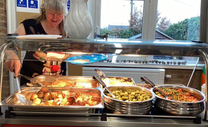 Image of Christmas dinner in our Christmas jumpers.