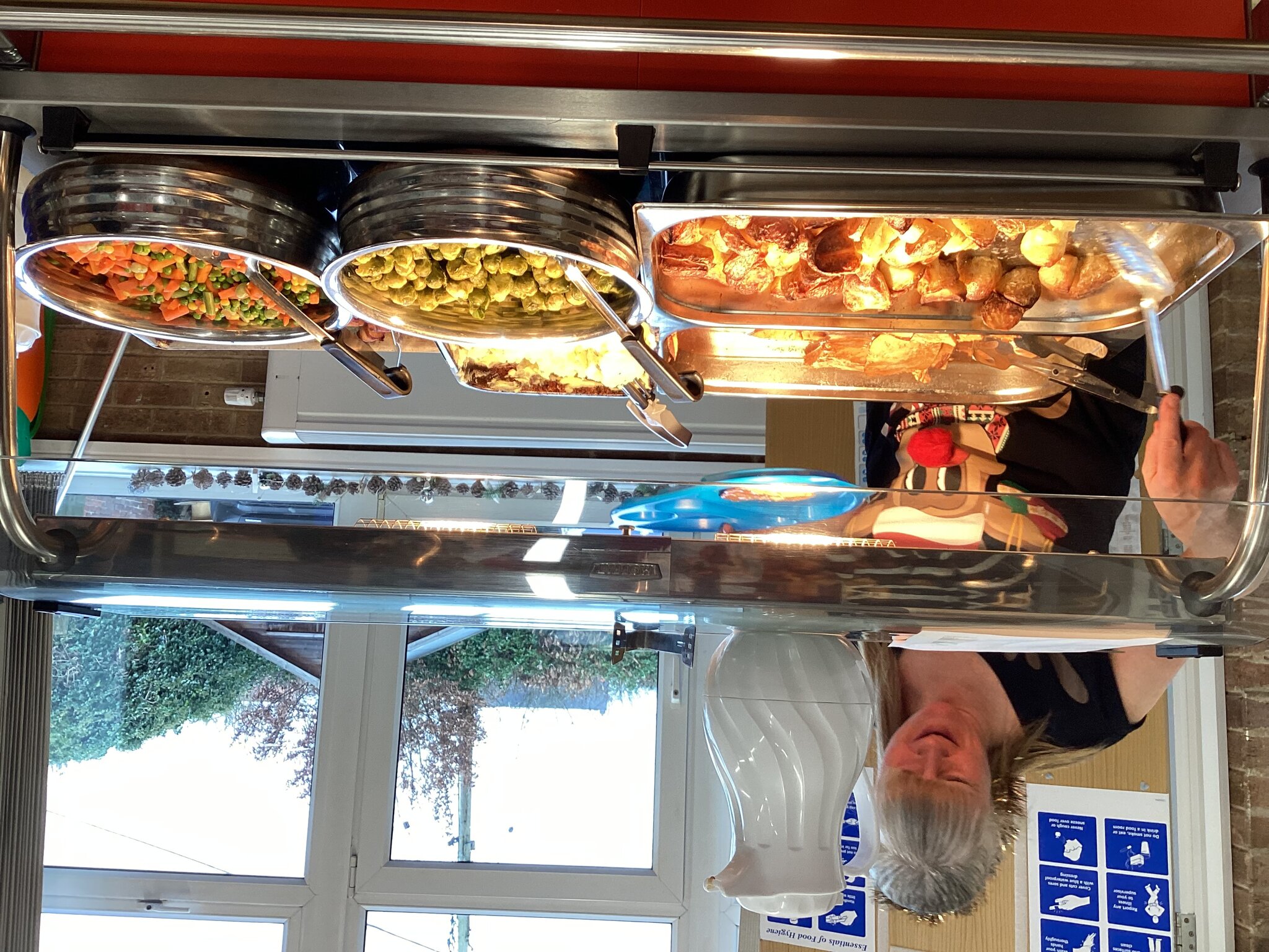 Image of Christmas dinner in our Christmas jumpers.