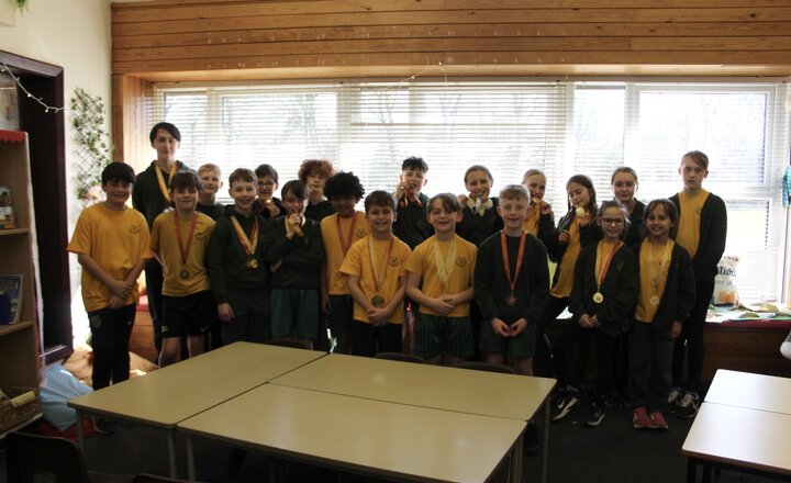 St Augustine's Year 5 and Year 6 pupils with their medals from the Darlington Primary Swimming Gala