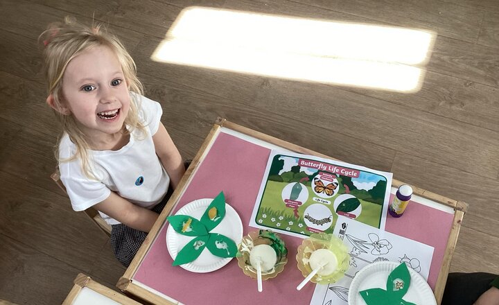 St Augustine's nursery pupil learning about the lifecycle of a butterfly