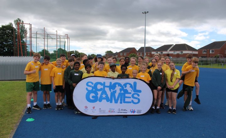St Augustine's pupils celebrating the success of their Quadkids athletics event