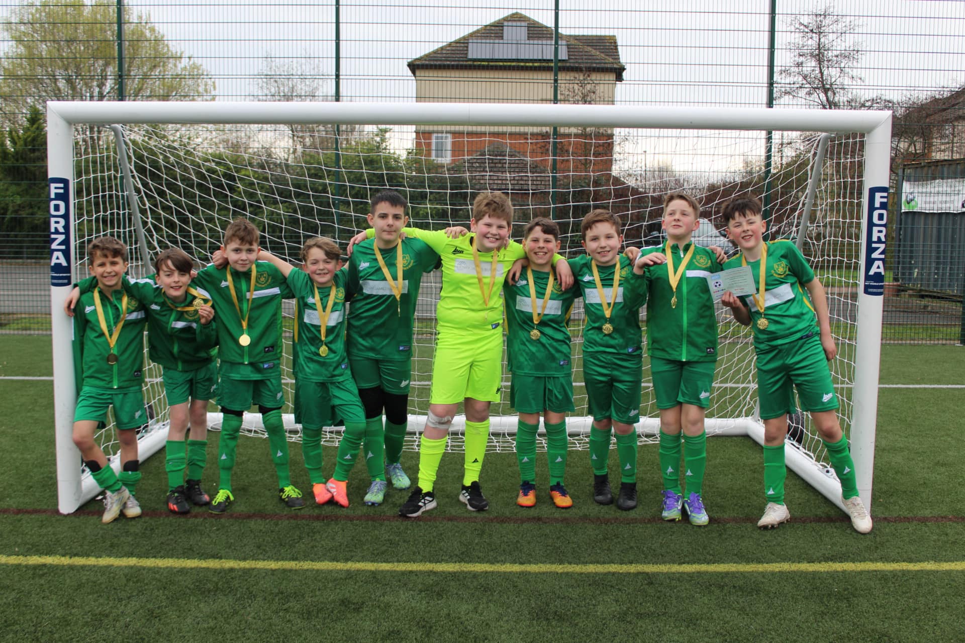 St Augustine's Year 5 and Year 6 boys with their medeals from the Darlington School Sport Partnership Football Festival