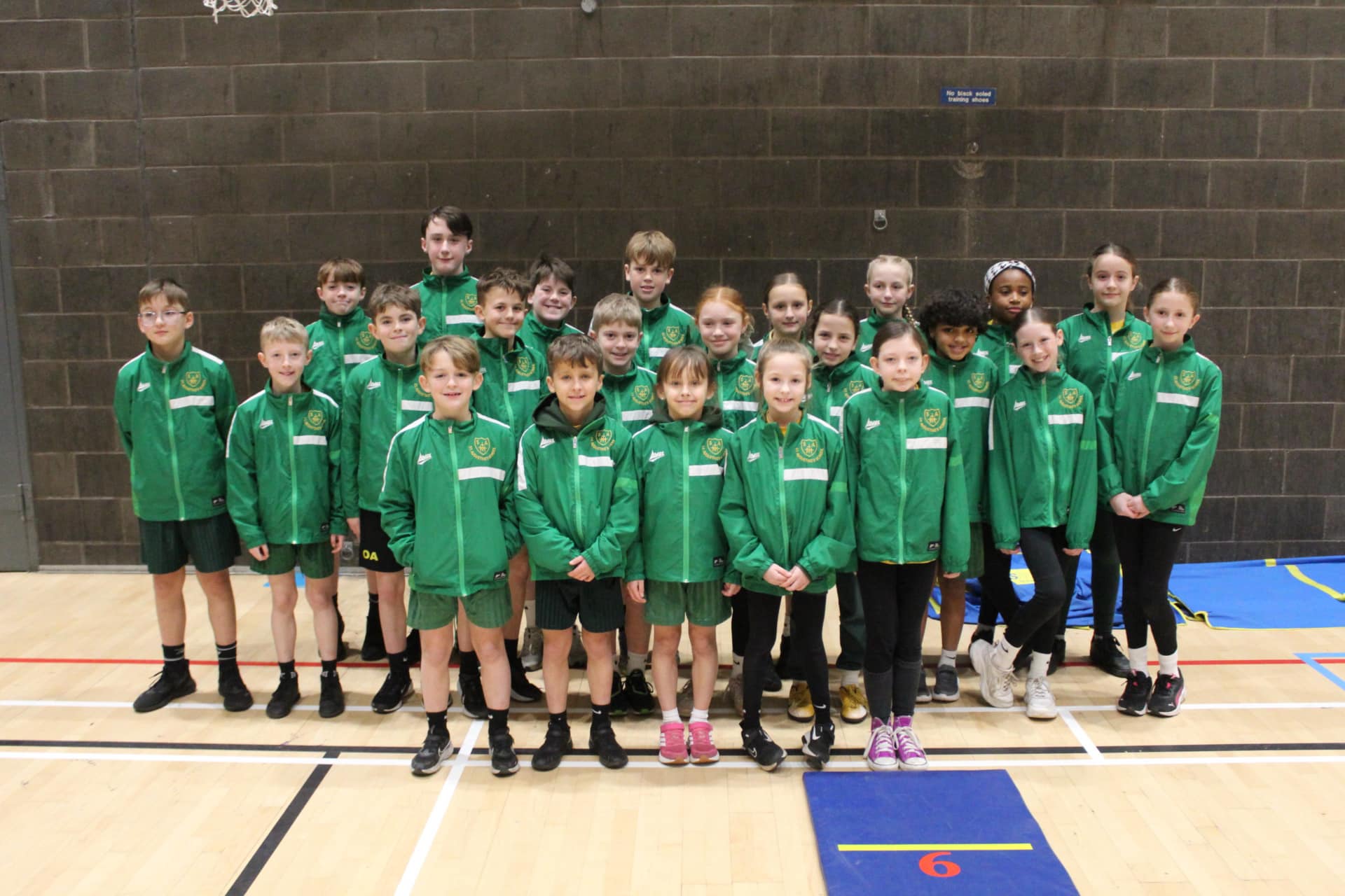 St. Augustine’s Year 5 and 6 Sports Hall Athletics team standing together at the Tees Valley Finals