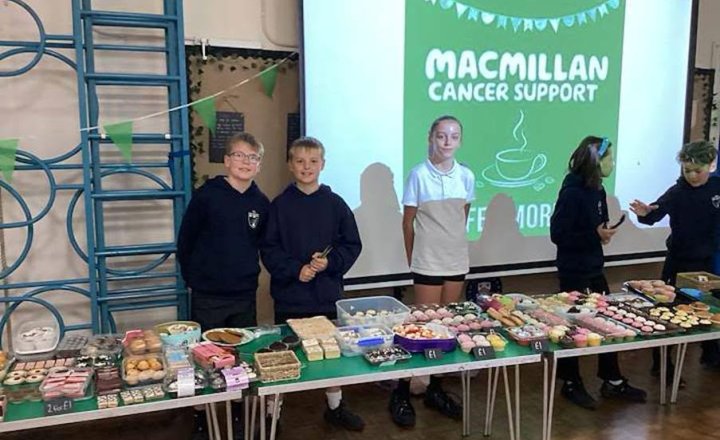 St Bede's pupils showing their support for Macmillan during their Macmillan Coffee Morning