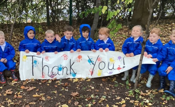 Young pupils say thank you to Thornton Log Company for their donations of logs