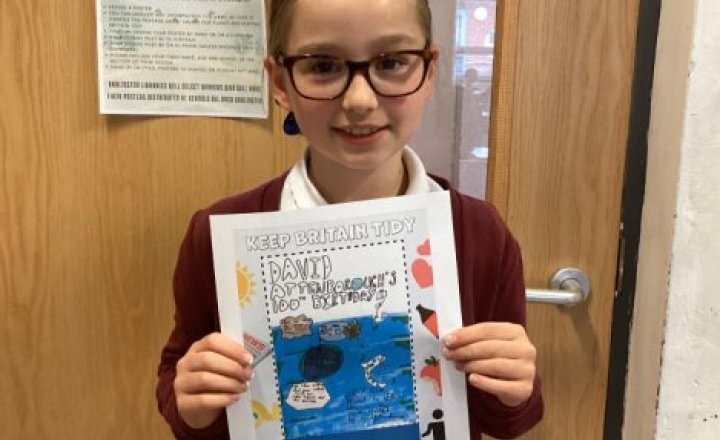 St Bede's pupil, Year 4 Ada, with her amazing winning entry for the Darlington Library competition