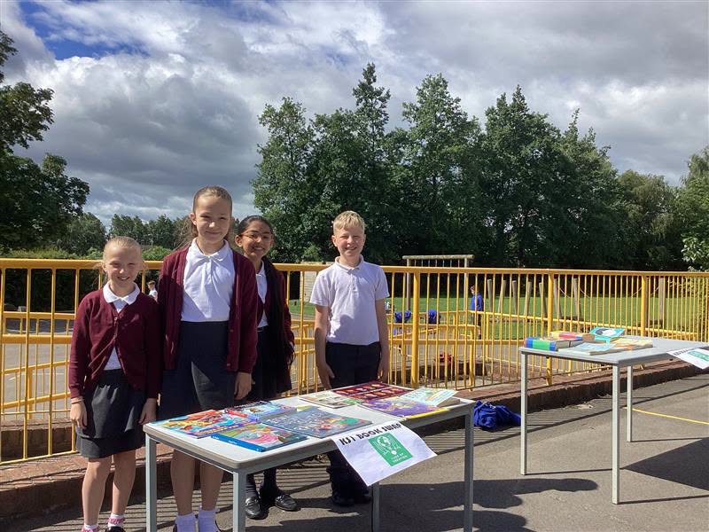 Pupils from St Bede's, hosting their school book swap event