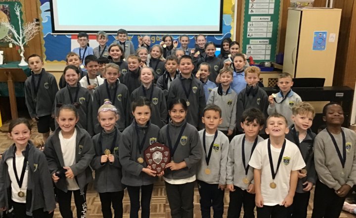 Image of Golden Presentation For Cross Country Stars!