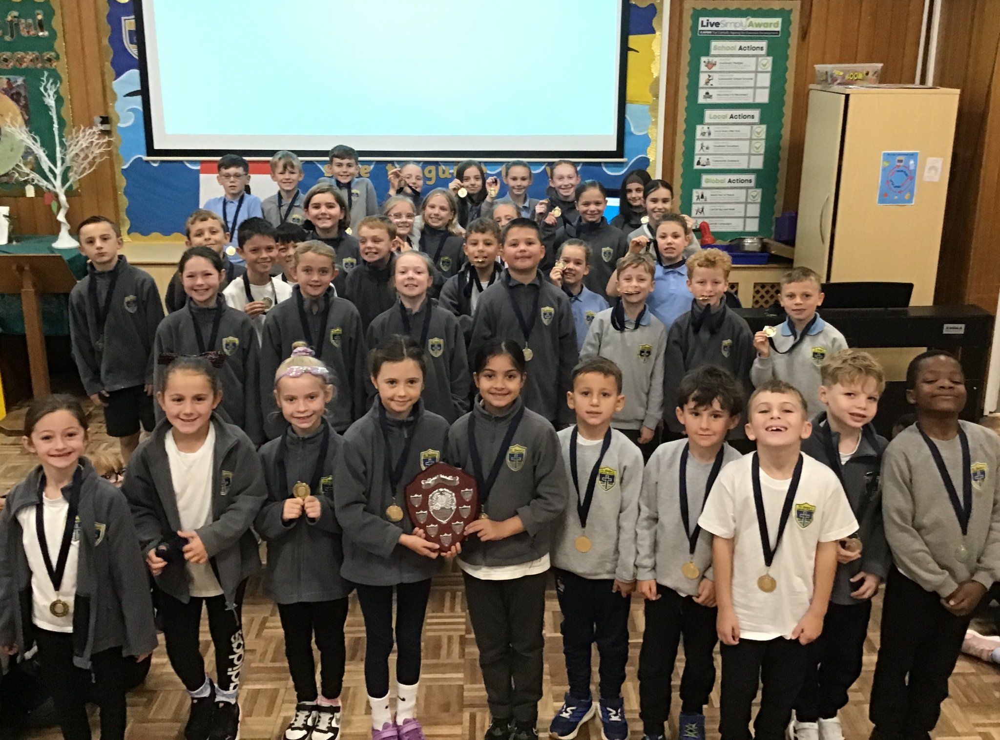 Image of Golden Presentation For Cross Country Stars!