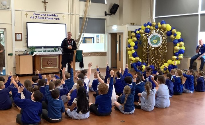 Year 3 listening to talks from inspiring visitors during Careers Day 