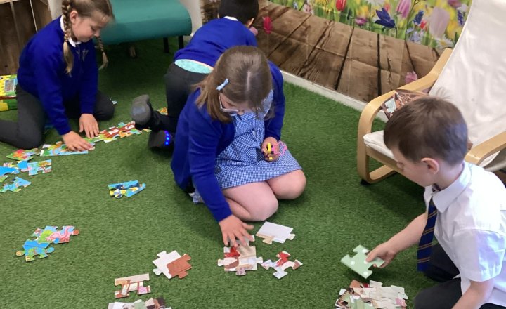 KS1 pupils enjoying their time at the Puzzle and Play Club
