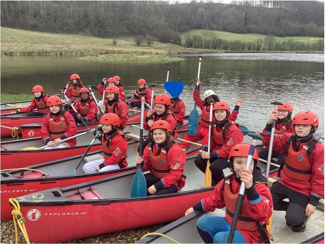 Year 6 pupils on kayaks during their residential at Peat Rigg