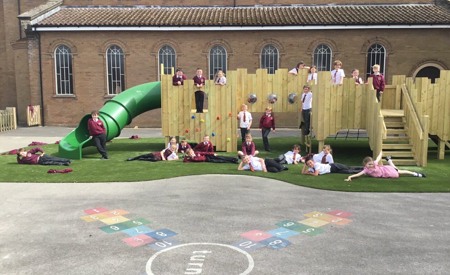 Image of Year 3 enjoy playing on Langley Castle