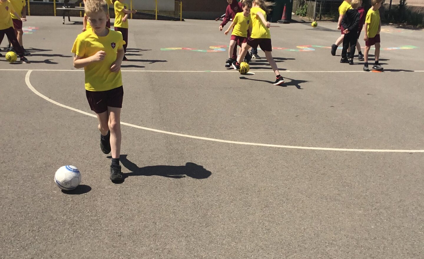 Image of Year 3 practise their ball skills