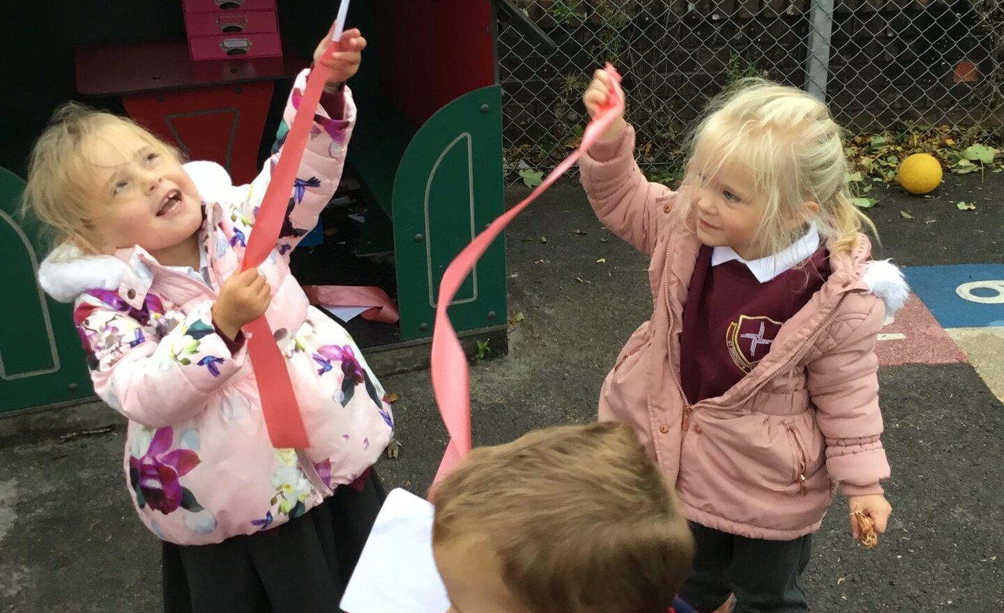 Image of Nursery having fun in the windy weather