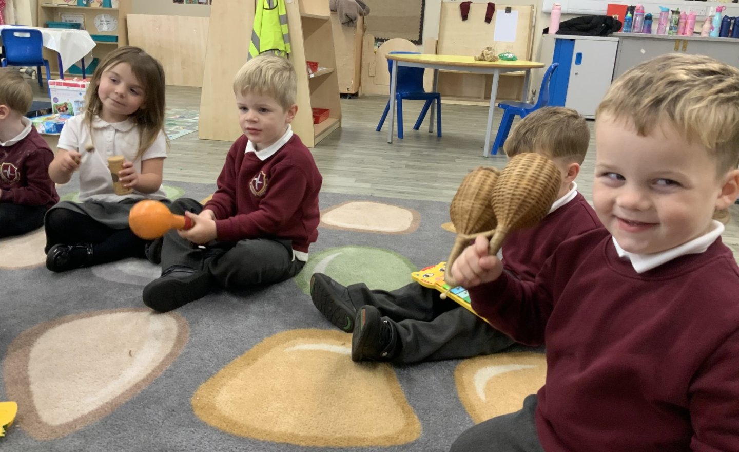 Image of Creating music in Nursery