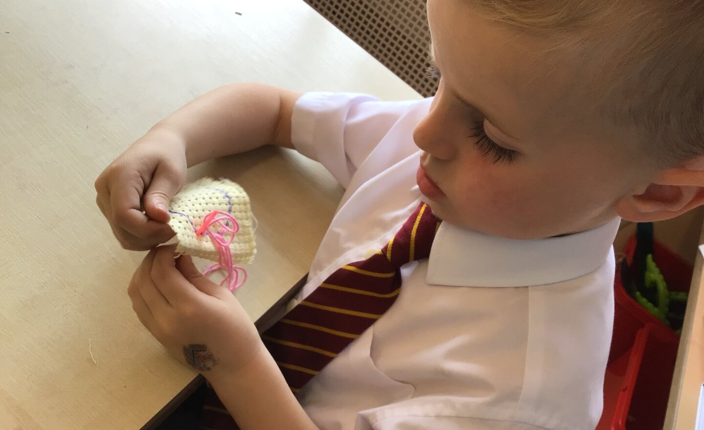 Image of Sewing and threading in Reception