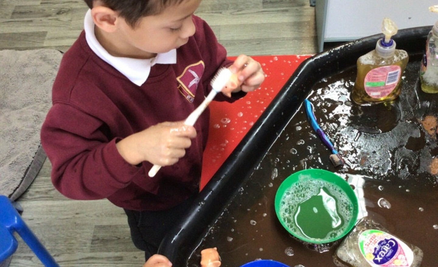 Image of Nursery practising their fine motor skills 