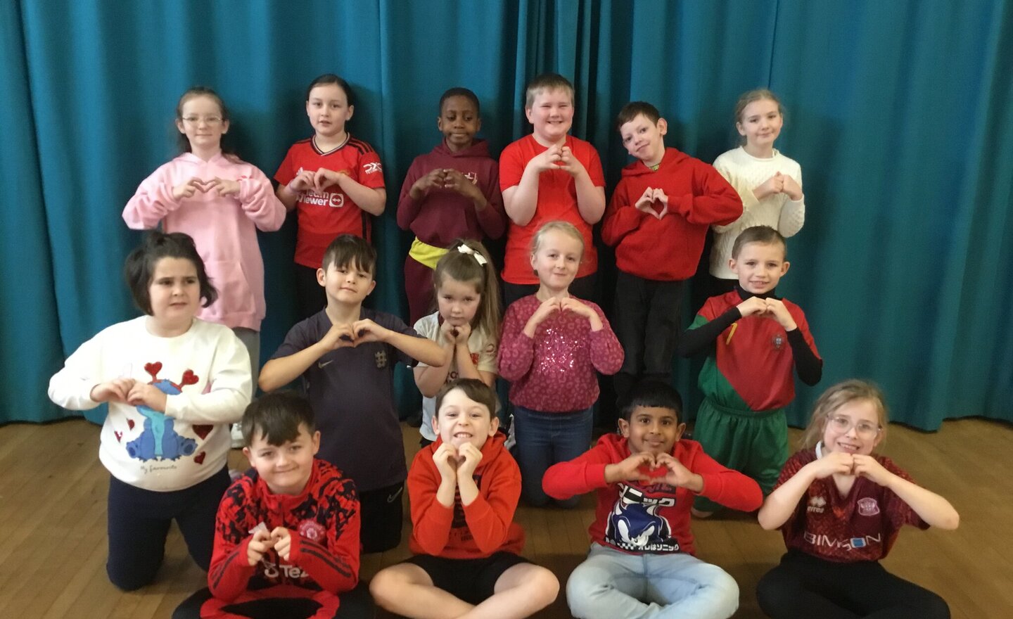 Image of Year 3 wear red for the Pope’s intention.