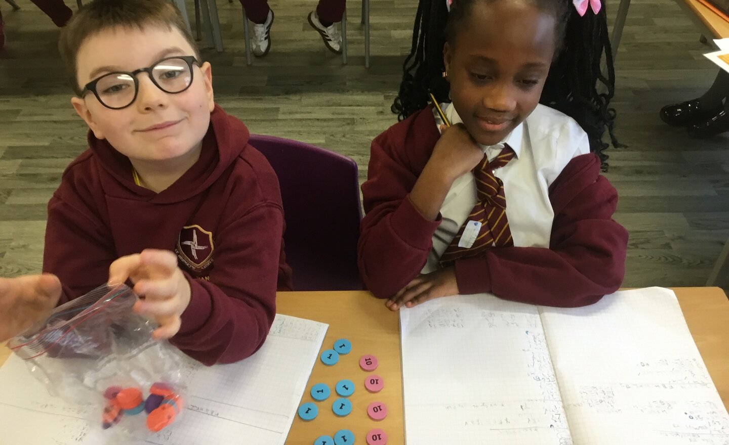 Image of Year 3 learn multiplication and division using base 10 and place value counters