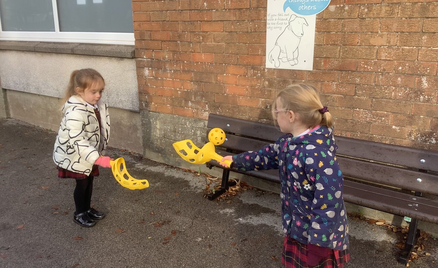 Image of Infants Using the New Playground Equipment