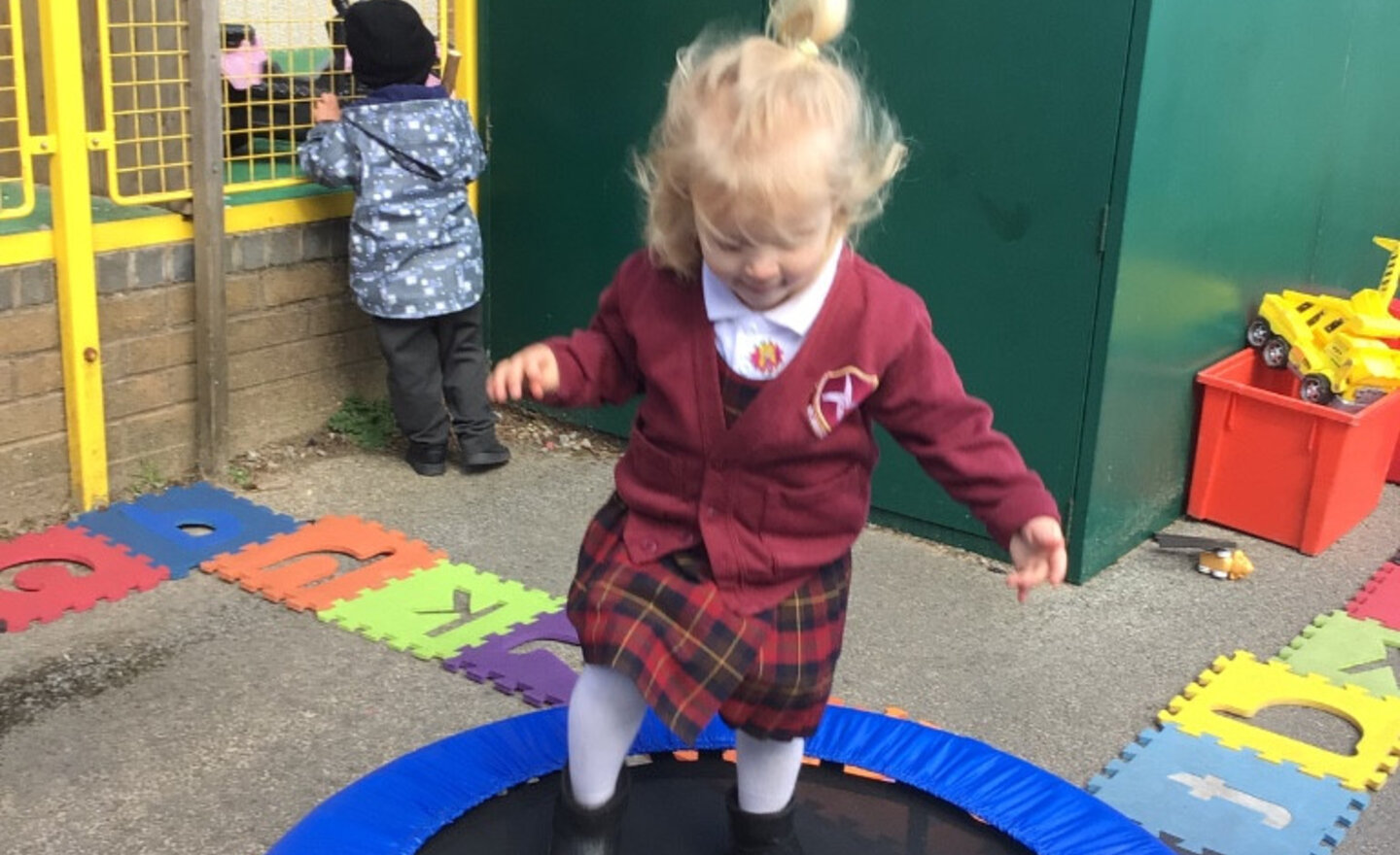 Image of Fun using the trampoline 