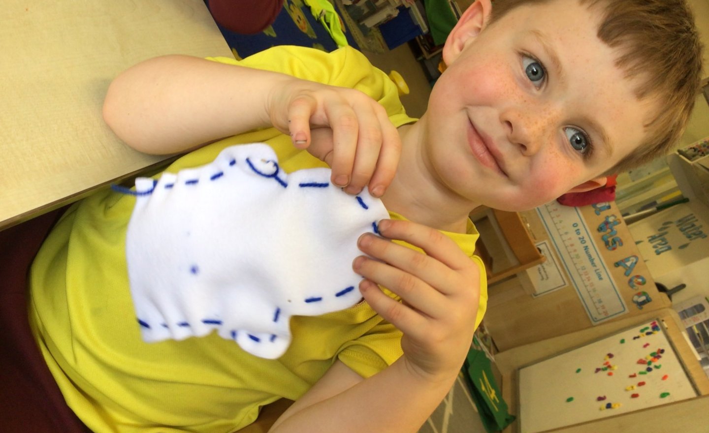 Image of Sewing and Threading Gingerbread Men