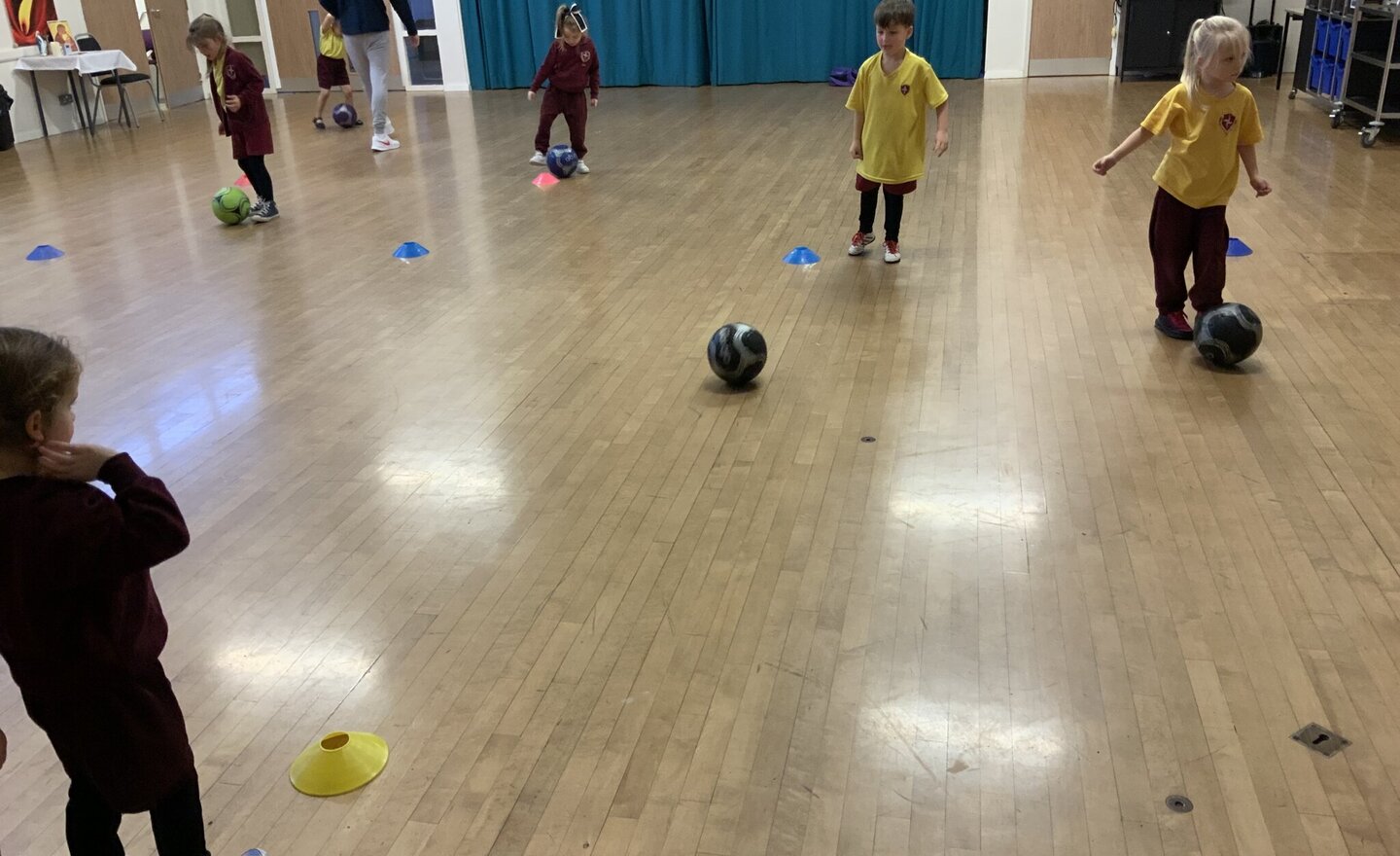 Image of Football coach in Reception