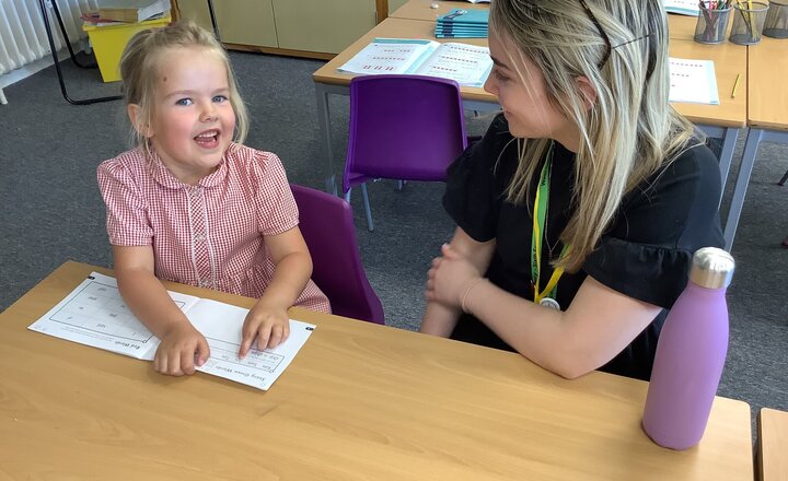 Image of Reading with volunteers from West Lakes Academy