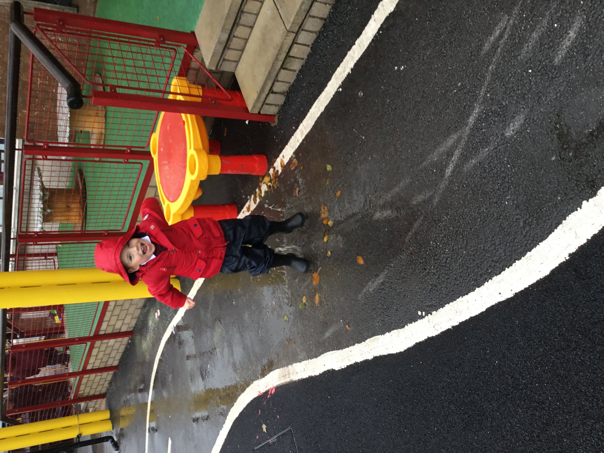 Image of Nursery out having fun in the rain!