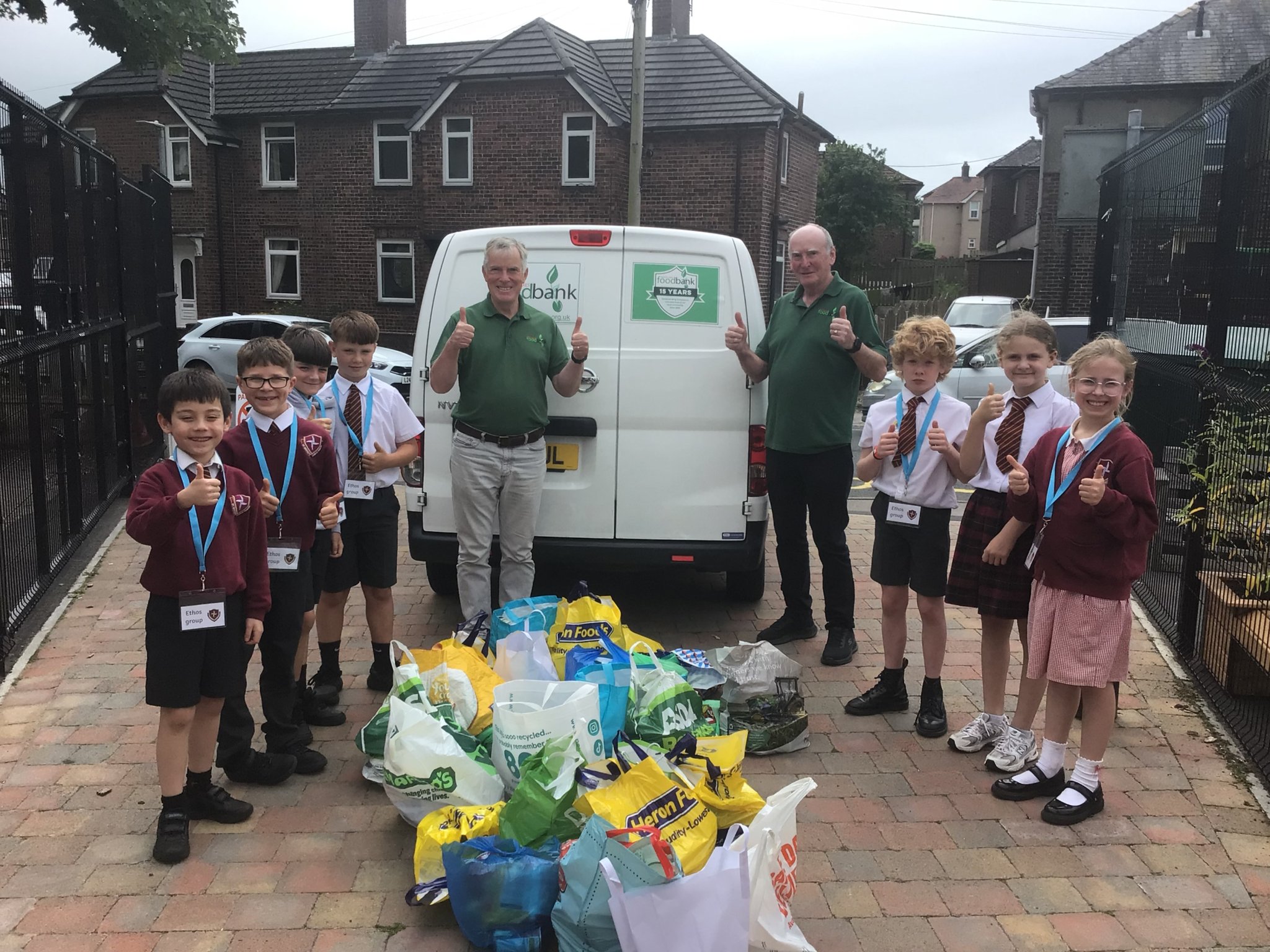Image of Ethos Group Give Food to Food Bank