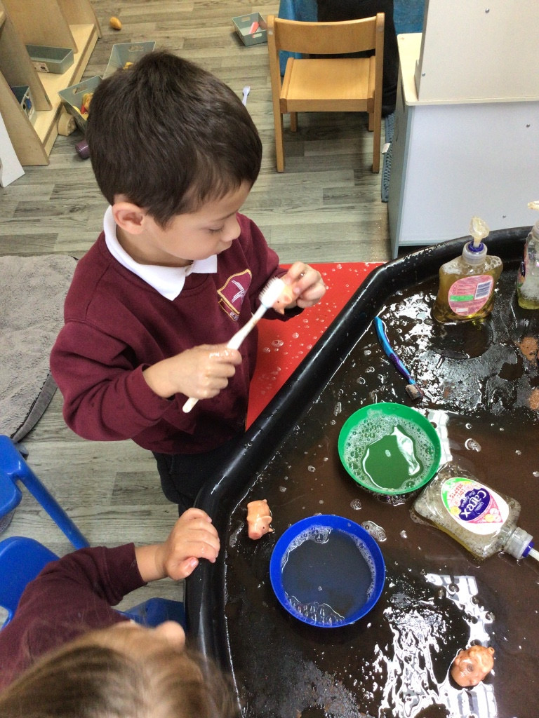 Image of Nursery practising their fine motor skills 
