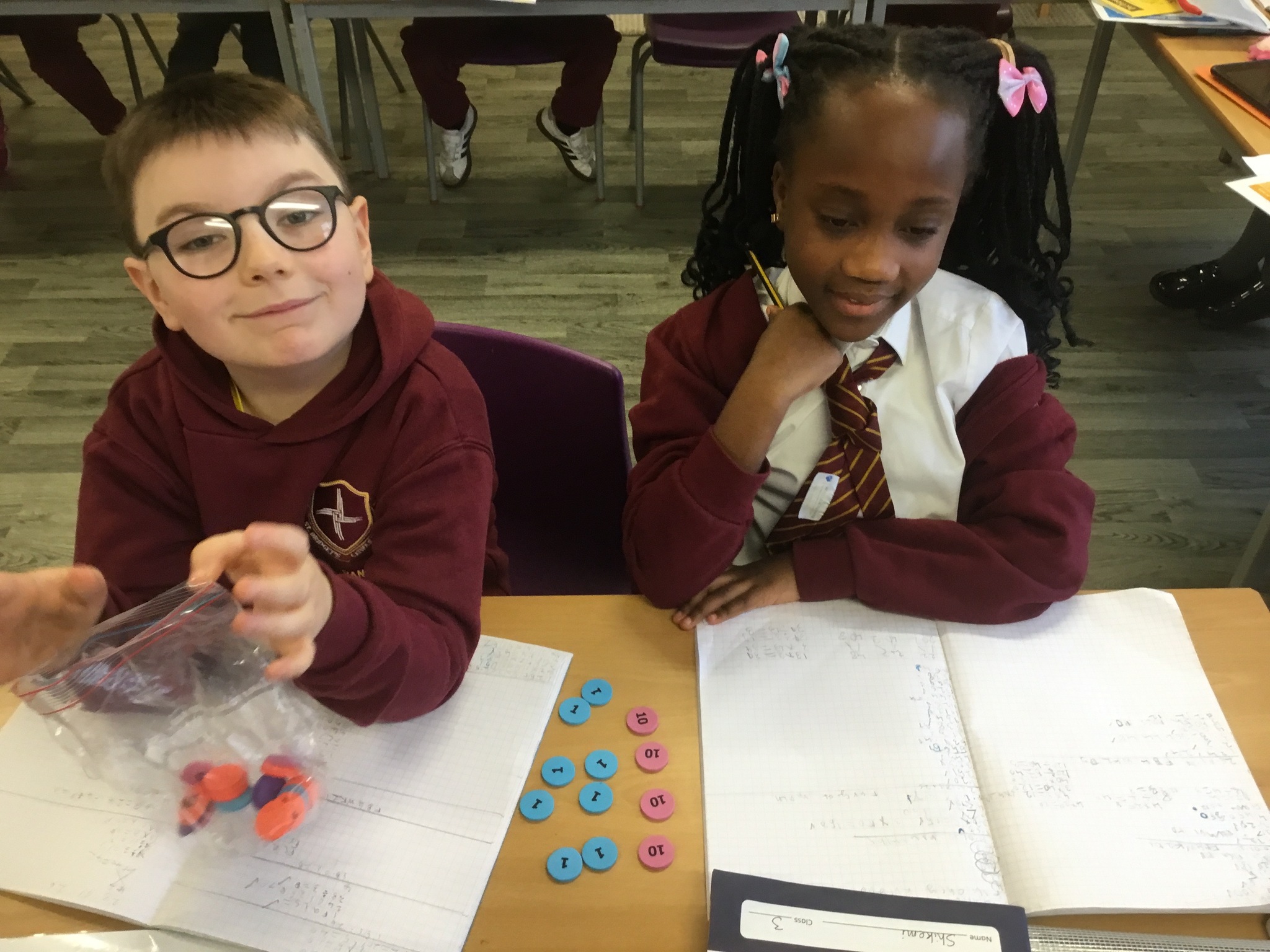 Image of Year 3 learn multiplication and division using base 10 and place value counters