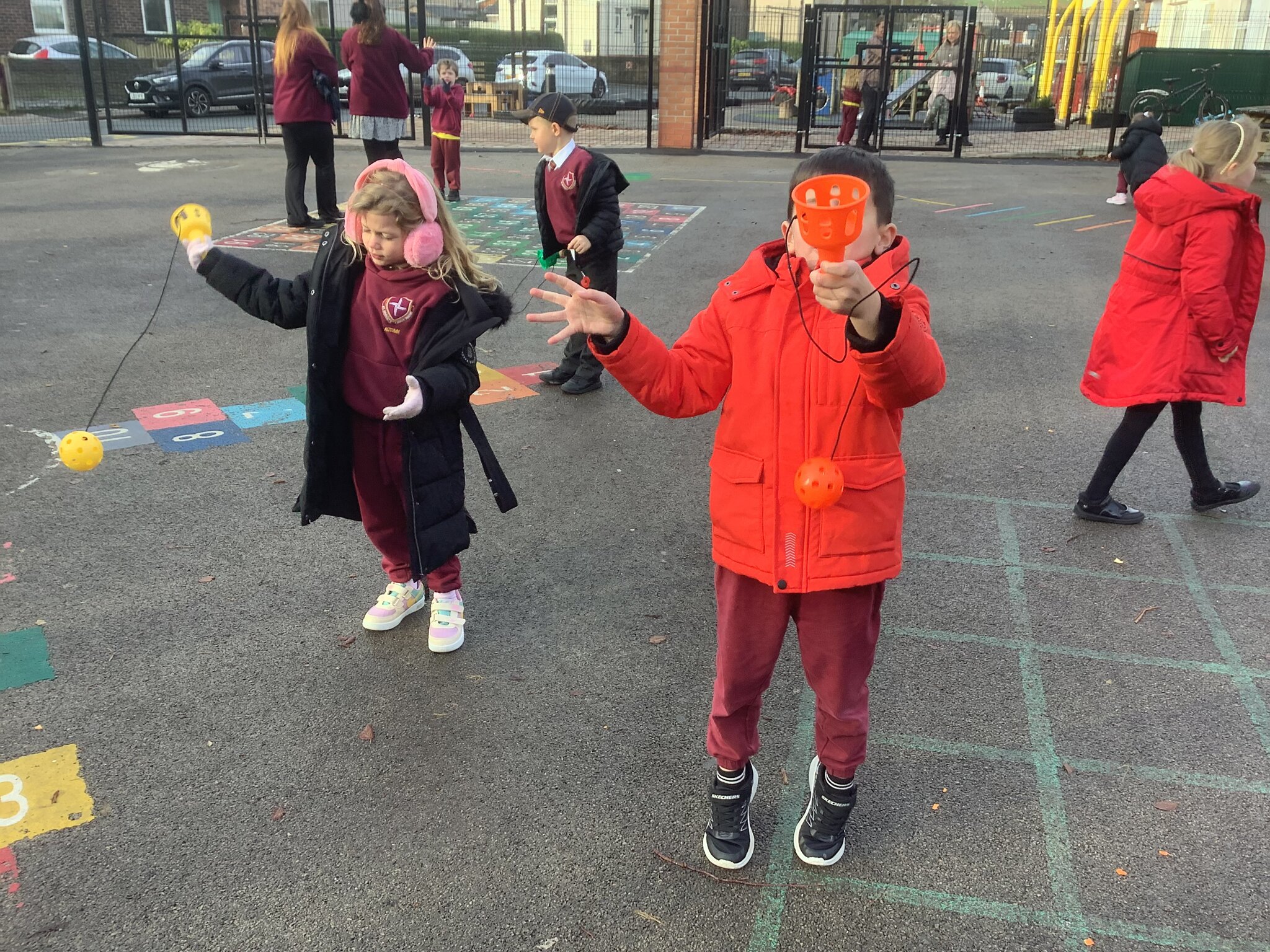 Image of Infants Using the New Playground Equipment