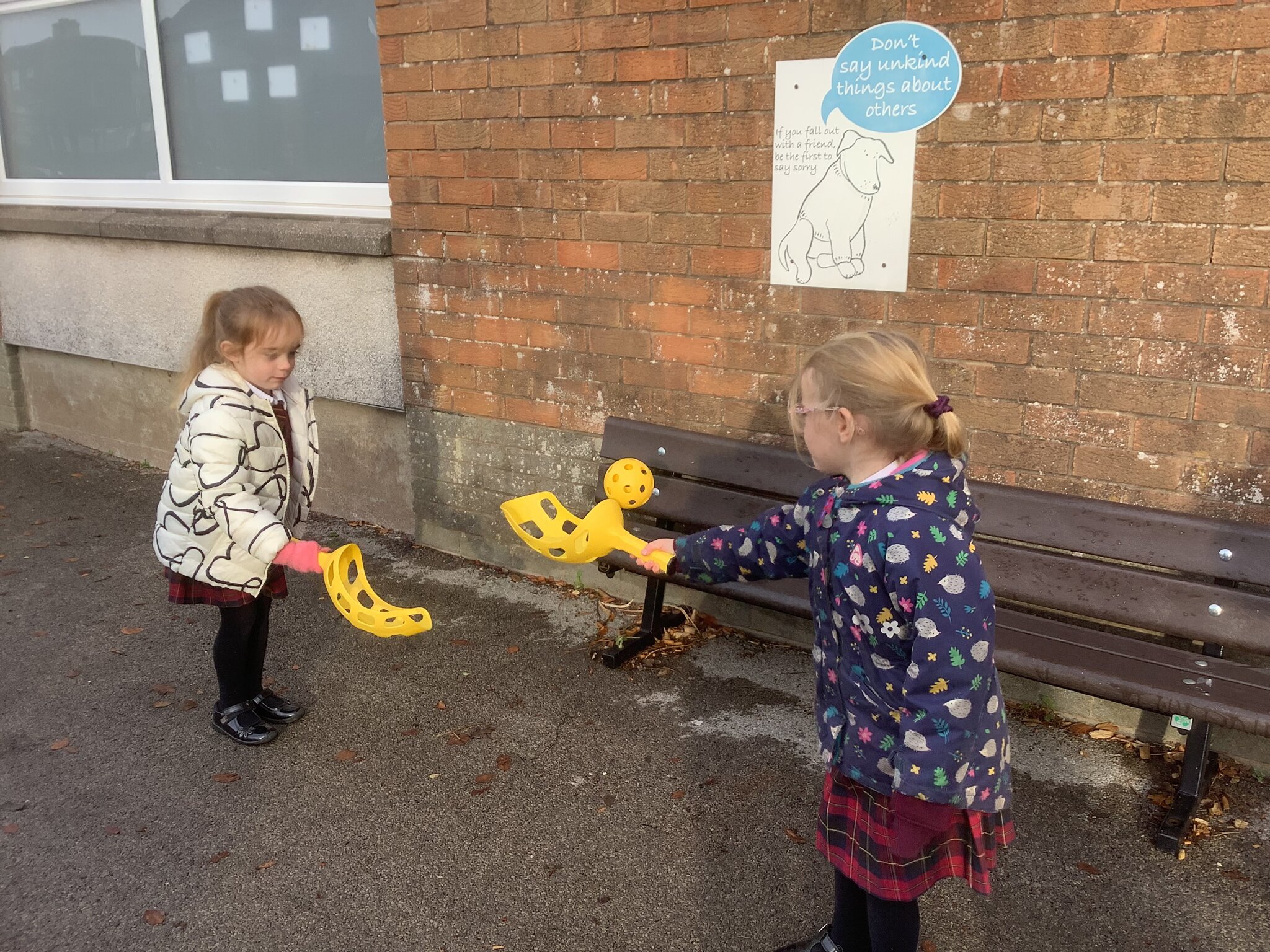 Image of Infants Using the New Playground Equipment