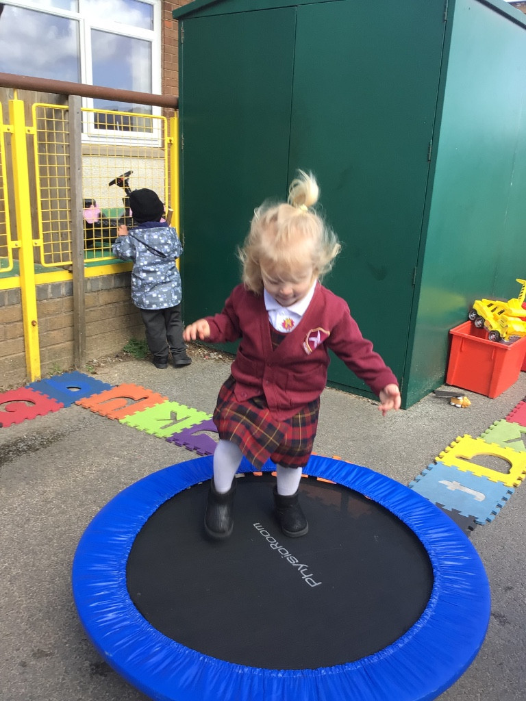 Image of Fun using the trampoline 