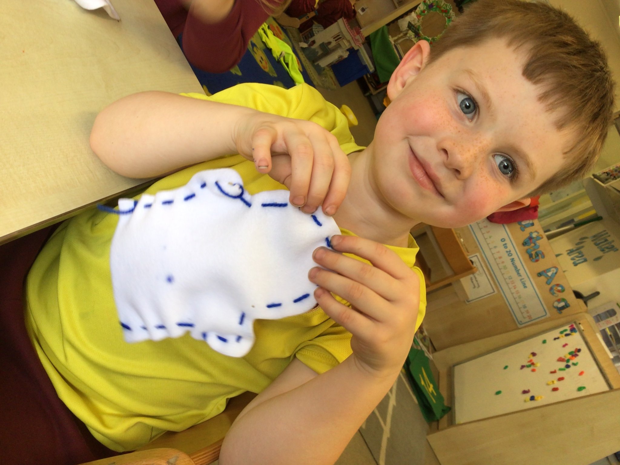 Image of Sewing and Threading Gingerbread Men