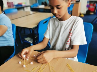 Image of Science club building bridges 