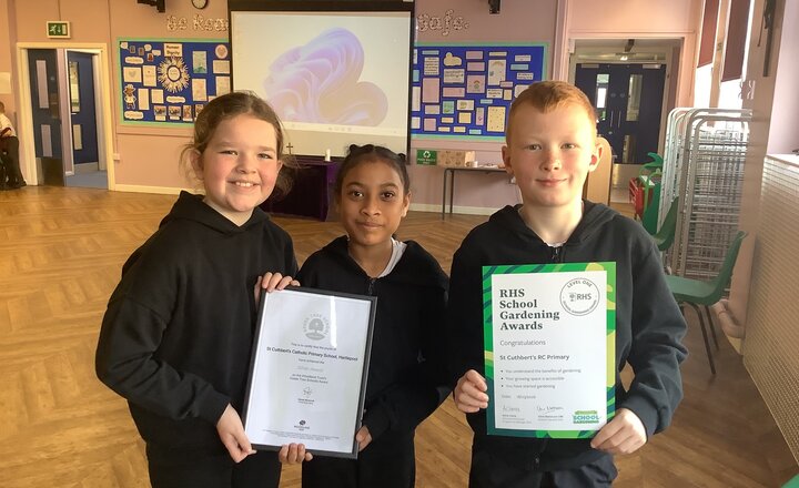 St Cuthbert's pupils celebrating their Woodland Trust Silver Award!