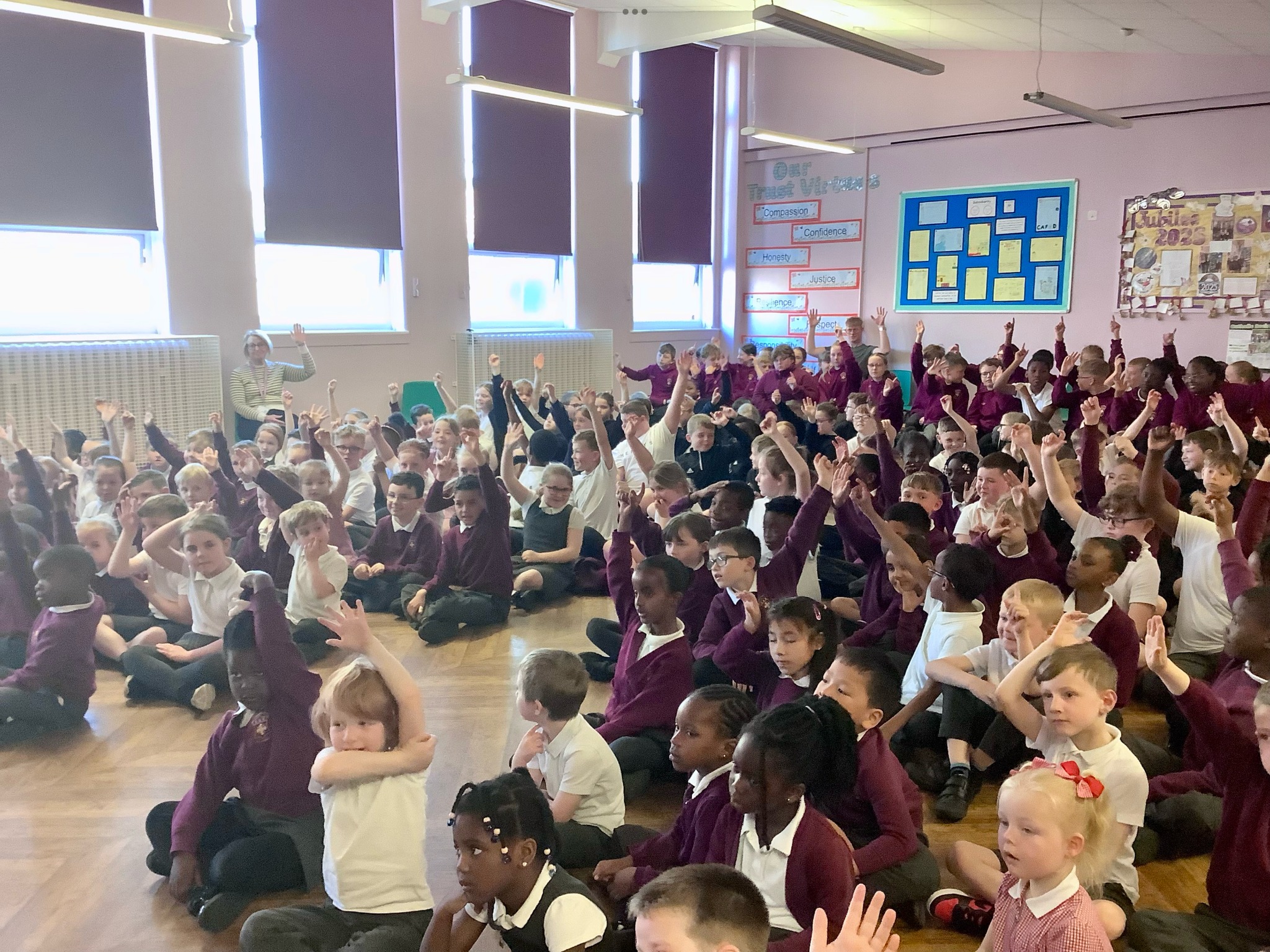 St Cuthbert's pupils enjoying the presentation by the Gardening Club