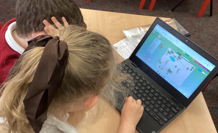 Class 1 pupils using Chromebooks as part of their learning