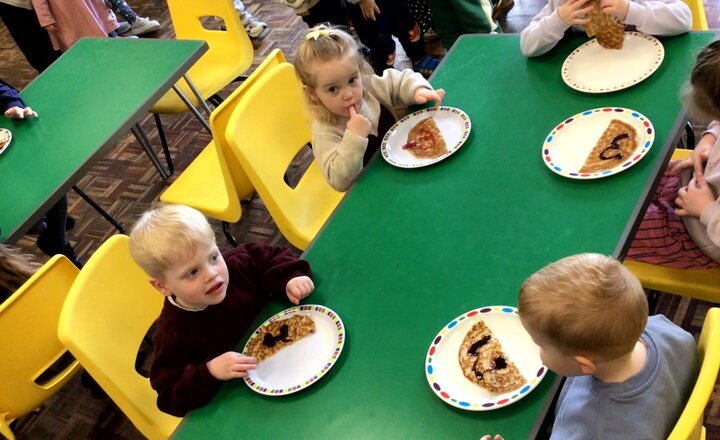 Early Years enjoying their pancakes on Shrove Tuesday