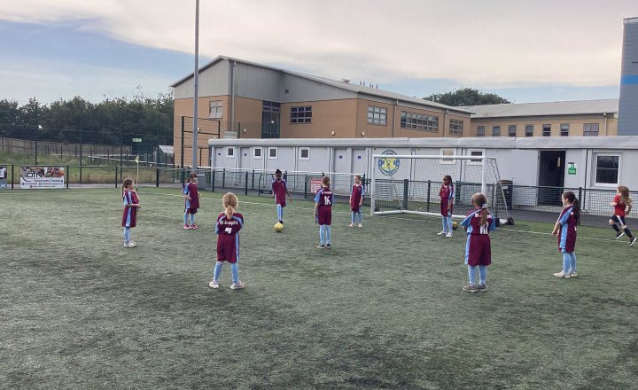 Image of Determination and Teamwork at Girls’ Football Festival