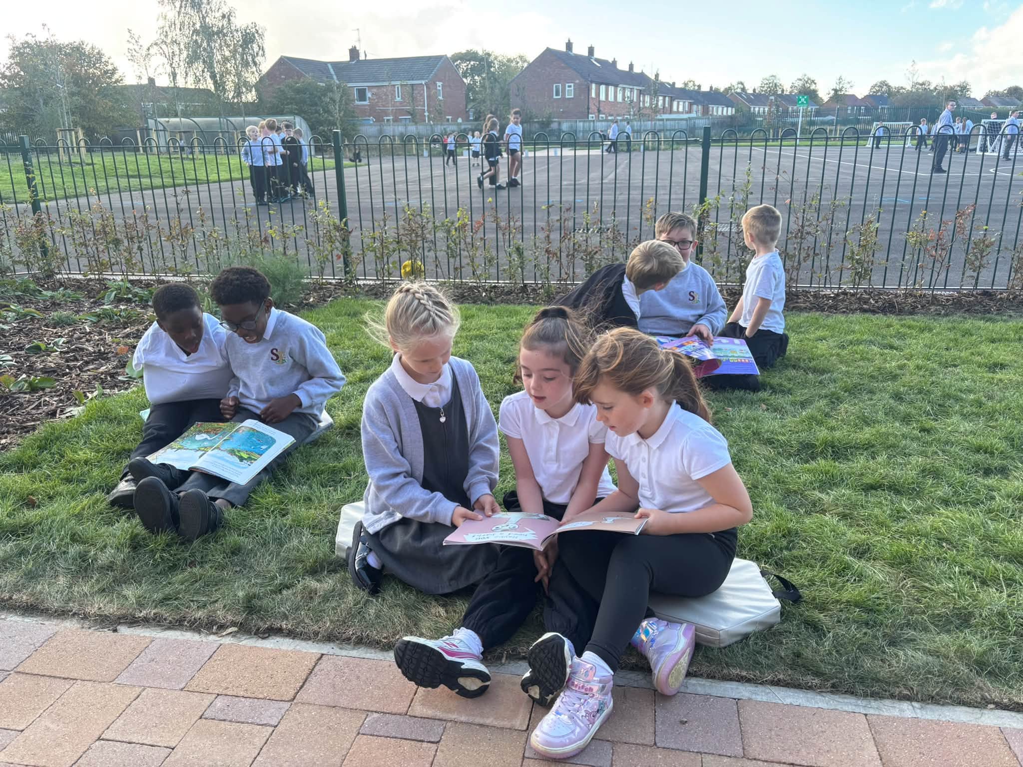 Image of Children Show Pride and Responsibility in New Outdoor Play Areas
