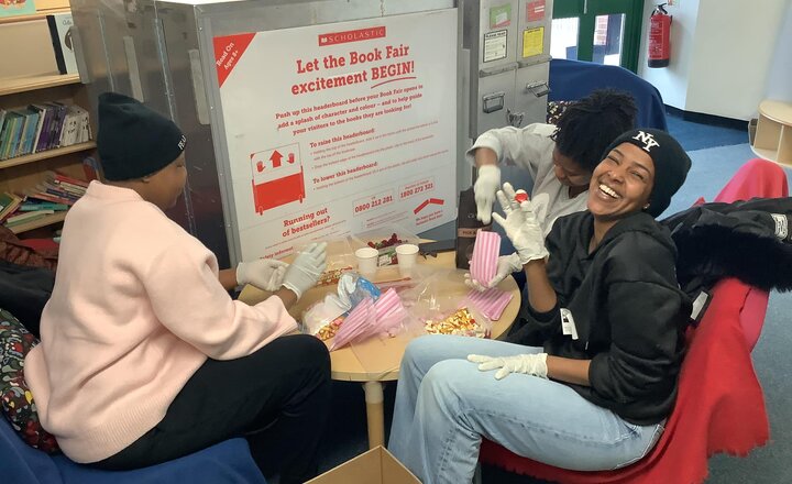 Parent volunteers helping the school with their upcoming Valentine's Disco