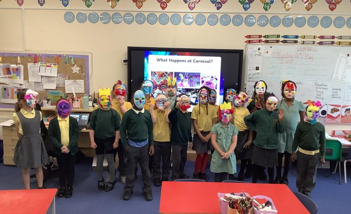 St Joseph's pupils wearing their excellent home made carnival masks!