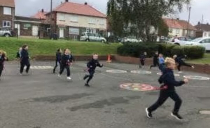 Image of Y3 enjoying Tag Rugby!
