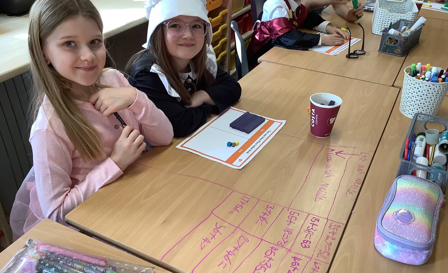 Image of Add two 2-digit numbers (across a 10)