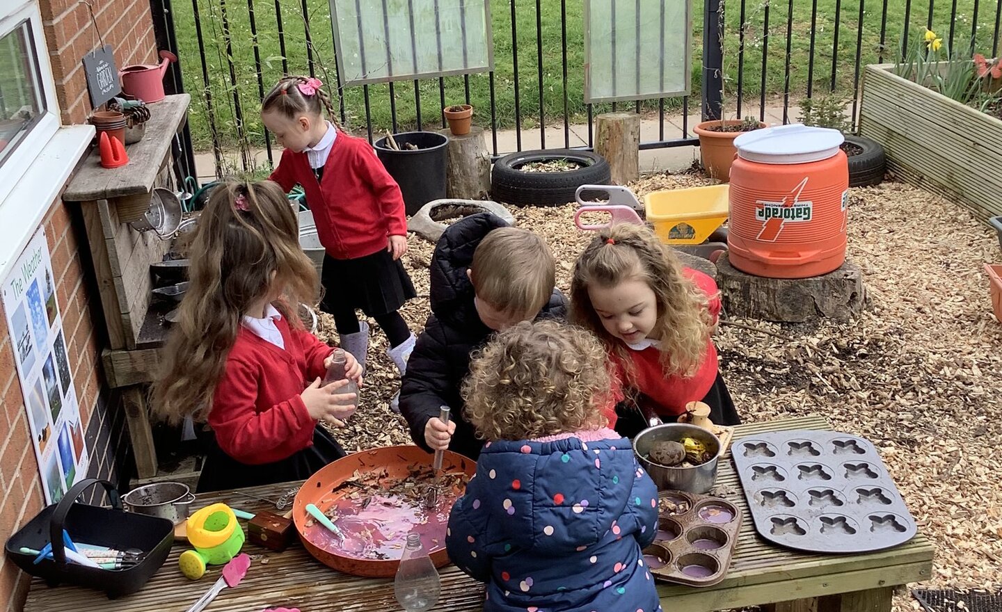 Image of Fun in the mud kitchen!