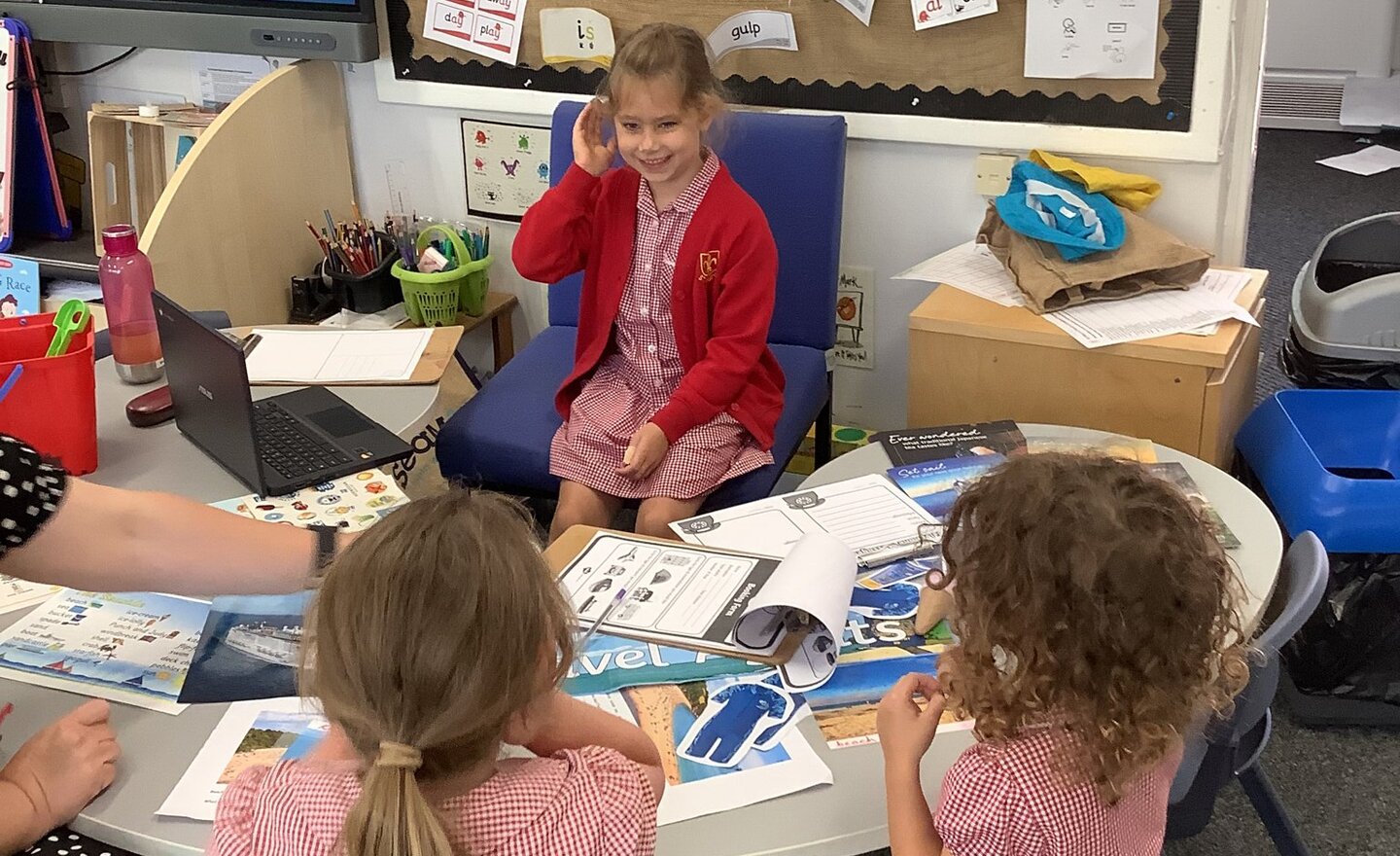 Image of Practicing our oracy skills in the travel agents!